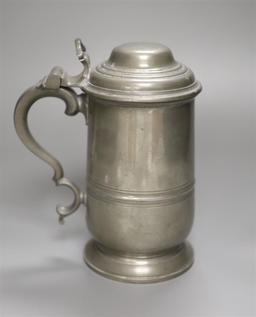 A novelty Alfred Dunhill pewter tobacco caddy, in the form of a lidded tankard, the hinged cover revealing a lidded interior, 22cm high